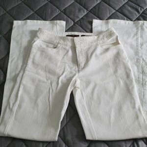 White jeans with embroidered waist and leg